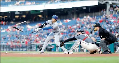  ?? PHOTO: GEOFF BURKE-USA TODAY ?? The Los Angeles Dodgers’ Shohei Ohtani’s bat shatters while hitting a ground ball against the Washington Nationals during their MLB game at Nationals Park in Washington on Tuesday.