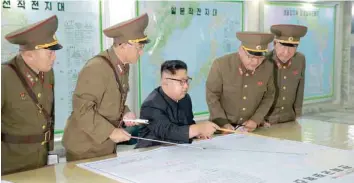  ?? — Reuters ?? North Korean leader Kim Jong-Un inspects the Command of the Strategic Force of the Korean People’s Army in an unknown location in North Korea in this undated photo released by Korean Central News Agency on Tuesday.