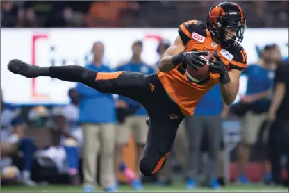  ?? The Canadian Press ?? B.C. Lions’ Bryan Burnham makes a reception against the Winnipeg Blue Bombers during the second half of a CFL football game in Vancouver in 2016.