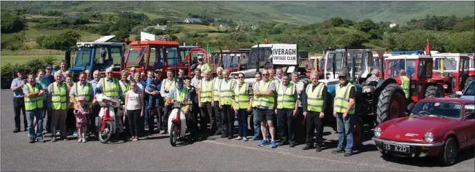  ?? Photo Michael Donnelly ?? Iveragh Vintage Club held its annual Vintage Tractor / Car run to Caherdanie­l on Sunday June 24. The outing began at the Waterville Inn and followed the route through Waterville, Cum a’ Ciste and Cum na hEorna and on through Caherdanie­l village before...