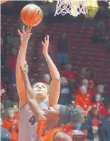  ?? JIM THOMPSON/JOURNAL ?? Jaisa Nunn, back, is one of the reasons the Lobos are 9-0 this season. UNM received 26 votes in Monday’s AP Poll but has yet to crack the top 25.