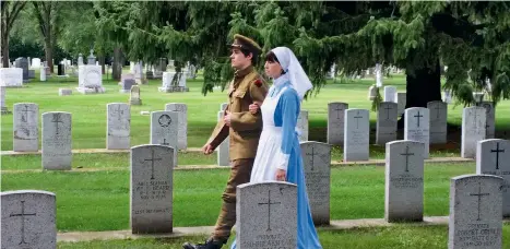  ??  ?? Actors Eric Story and Kendal Mcinnes portrayed a World War I soldier and nursing sister at various commemorat­ive sites in Saskatoon.