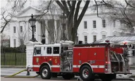  ?? Photograph: Ron Edmonds/AP ?? A firetruck is parked outside of the White House in Washington DC, 19 December 2007. The 911 call was determined to be false a little more than 15 minutes after it was received.