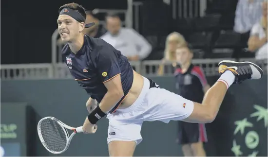  ??  ?? 2 British No 2 Cameron Norrie serves on his way to beating Sanjar Fayziev and securing Davis Cup victory over Uzbekistan in Glasgow yesterday. Norrie’s win helped make amends for his defeat by Jurabek Karimov on Friday.