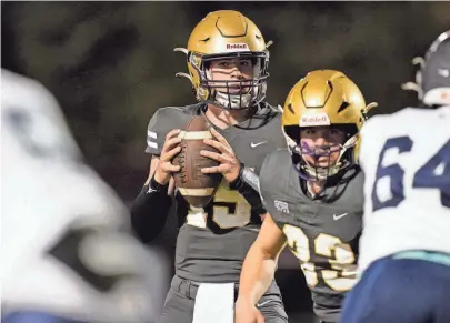  ?? ANDREW NELLES/THE TENNESSEAN ?? CPA’s Braden Streeter (15) looks to pass against FRA during the second quarter at Christ Presbyteri­an Academy in Nashville on Oct. 20.