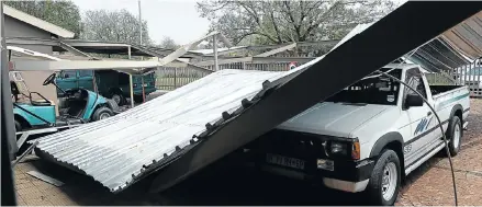  ?? Picture: Gallo Images ?? Insurers are exploring how sensors installed in homes and appliances can help detect disasters before they occur, including climate-related disasters such as the one pictured — in which a hailstorm collapsed a car port — thus saving insurers in claims.