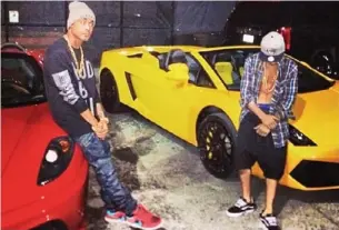  ??  ?? Posing: Sharief and Bieber in front of their high-performanc­e cars