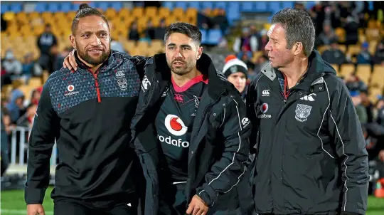  ?? PHOTOSPORT ?? Warriors halfback Shaun Johnson is helped from the ground by Manu Vatuvei at Mt Smart Stadium on Friday night.