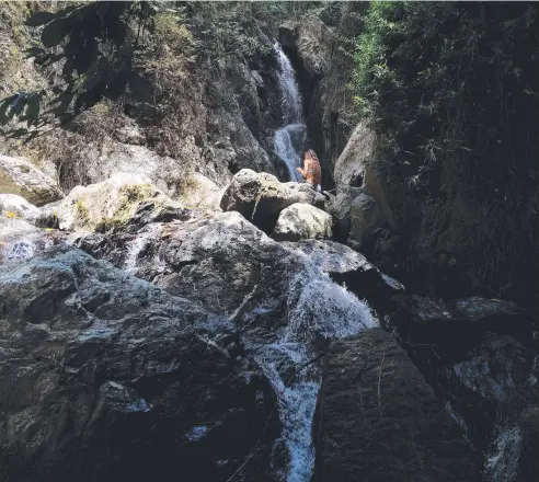  ?? Picture: STEWART McLEAN ?? RELAX: Fairy Falls is small, but deep and perfect for a dip during the sweltering humidity of a Cairns summer.