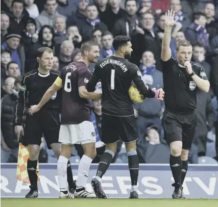  ??  ?? 0 Referee John Beaton rules out Don Cowie’s 16th-minute strike at Ibrox on Saturday for offside.