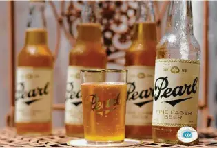  ??  ?? The new Pearl xXx beer will be available in stores across Texas for about $9.49 per six-pack in early June.