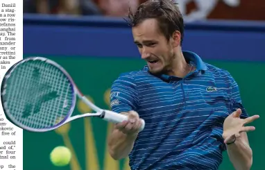  ??  ?? Daniil Medvedev of Russia hits a return shot against Stefanos Tsitsipas of Greece during their men's singles semifinals match at the Shanghai Masters tennis tournament in Shanghai on Saturday. Medvedev won 7-6 (7/5), 7-5.