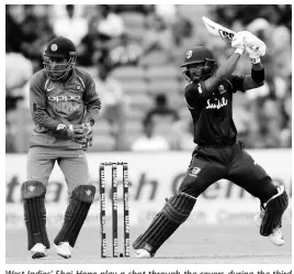  ?? AP ?? West Indies’ Shai Hope play a shot through the covers during the third one-day internatio­nal match between India and West Indies in Pune, India, on Saturday, October 27, 2018.