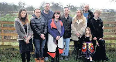  ?? Andy Lambert ?? ●●Residents are unhappy at the height of the screening mound of soil between their homes and the new airport relief road