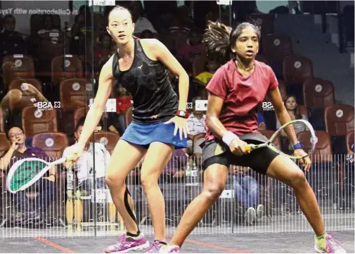  ??  ?? Title in the bag?: S. Sivasangar­i (right) believes that with Low Wee Wern (left) back in the form and the ever-reliable Nicol David leading the team, Malaysia should clinch the team gold medal at the Indonesia Asian Games.