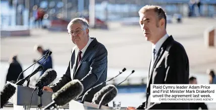  ?? CHRIS FAIRWEATHE­R/HUW EVANS AGENCY ?? Plaid Cymru leader Adam Price and First Minister Mark Drakeford unveil the agreement last week.