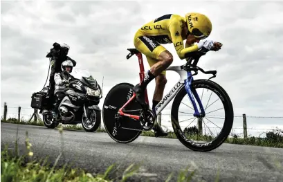  ?? FOTO: LEHTIKUVA/AFP/MARCO BERTORELLO ?? Walesaren Geraint Thomas är mycket nära titeln i Tour de France anno 2018.