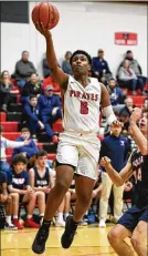  ?? CONTRIBUTE­D PHOTOS BY WEST CARROLLTON YEARBOOK STAFF ?? West Carrollton’s Kalen McKinney, left, a 6-foot-4 senior guard, leads the MVL in scoring (17.2 points), while Austin Bauer-Jones , a 6-3 senior forward, leads the MVL in rebounding (9.6) and is third in assists (4.4). Bauer-Jones, an All-GWOC performer last year, averages 7.9 points.