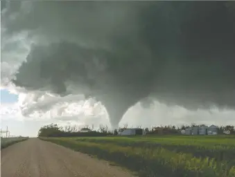  ??  ?? Swift Current storm chaser Craig Hilts captured this tornado that touched down near Glenbain on Saturday.