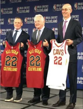  ?? DAVID S. GLASIER — THE NEWS-HERALD ?? Cavaliers owner Dan Gilbert, left, Cuyahoga County Council president Dan Brady and NBA commission Adam Silver, right, pose for photograph­s at the news conference on Nov. 1 at which the formal announceme­nt was made of Cleveland hosting the 2022 NBA All-Star Game.