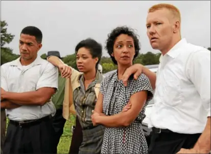  ?? PHOTO COURTESY FOCUS FEATURES ?? Joel Edgerton, right, and Ruth Negga, second from right, star in “Loving.”