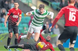  ?? Picture: PA. ?? Former Dundee defender Jack Hendry is sent tumbling by Youssouf Mulumbu.