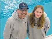  ?? Dave Stewart/Hearst Connecticu­t Media ?? New Canaan’s Emma Kelly with diving coach Joe Somma at the New Canaan YMCA. Kelly, who moved to New Canaan from Hungary earlier this year, won the FCIAC, Class L and State Open championsh­ips during the Fall 2023 season.