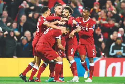  ?? Rex Features ?? Liverpool are unbeaten at home in the Premier League this season and are expected to finish that way against Brighton at Anfield today and settle their top-four finish and a place in next season’s Champions League.