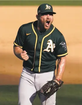  ?? Marcio Jose Sanchez / Associated Press ?? A’s closer Liam Hendriks racked up 14 saves in 15 opportunit­ies this season. But he can become a free agent in the offseason and might not be back.