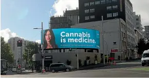  ??  ?? Helius Therapeuti­cs’ billboard in Auckland’s Anzac Ave advertisin­g cannabis as a medicine has received support as well as flak.