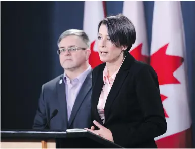  ?? SEAN KILPATRICK / THE CANADIAN PRESS FILES ?? Debi Daviau, right, president of the Profession­al Institute of the Public Service of Canada, says the federal government needs to act fast to replace the troubled Phoenix pay system if it wants to win back public servants’ confidence.