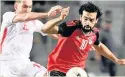  ??  ?? DETERMINED Salah in action for Egypt