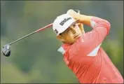  ?? Warren Little Getty Images ?? “I WOULDN’T be where I am without my dad,” says Gary Woodland, shown at the third tee Sunday.