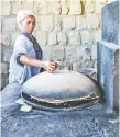  ??  ?? Making the Ethiopian sourdough flatbread known as injera takes seven days, as chef Yohanis Gebreyesus explains in his debut cookbook.