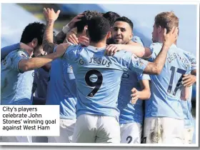  ??  ?? City’s players celebrate John Stones’ winning goal against West Ham