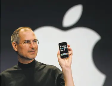  ?? Paul Sakuma / Associated Press 2007 ?? “Every once in a while, a revolution­ary product comes along that changes everything,” Apple CEO Steve Jobs said in introducin­g the iPhone during his keynote address at Macworld conference in January 2007.