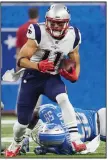 ?? AP/RICK OSENTOSKI ?? New England Patriots wide receiver Julian Edelman and an observant fan of his Instagram page helped prevent a possible school shooting.
