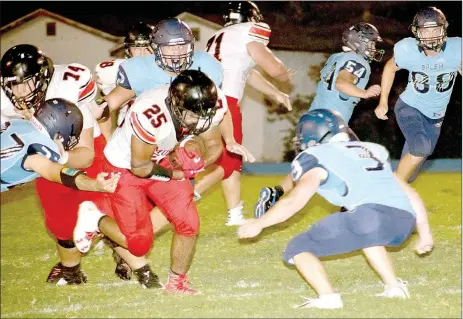  ?? RICK PECK/SPECIAL TO MCDONALD COUNTY PRESS ?? McDonald County tailback Isrrael De Santiago breaks into the secondary of the Salem Tiger defense during the Mustangs’ 19-6 win on Aug. 18 at Salem High School. De Santiago finished with 156 yards on 22 carries.