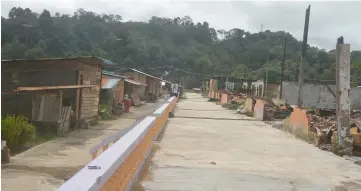  ??  ?? Photo shows the temporary wooden houses, built by the villagers after fire destroyed their longhouse in April this year.