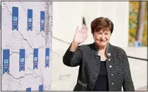  ?? ?? Internatio­nal Monetary Fund President Kristalina Georgieva waves as she arrives for a meeting of G20 finance and health ministers at the Salone delle Fontane (Hall of Fountains) in Rome, Oct. 29, 2021. (AP)