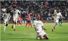  ?? Photograph: Juan Medina/Reuters ?? Joselu, the Real Madrid forward, celebrates after helping to force Stefan Savic’s own goal.
