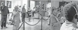  ?? Michael Ciaglo / Houston Chronicle ?? Galleria shoppers watch the filming of “Houston Life,” a new show from KPRC.