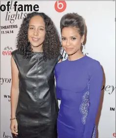  ??  ?? director Prince-bythewood (left) and Mbatha-Raw attend the premiere of ‘beyond The Lights’ at ArcLight hollywood on Wednesday in hollywood, California. (Left) Mbatha-Raw poses for a portrait while promoting ‘beyond the Lights’ in Los Angeles last oct...