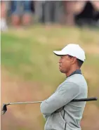  ?? AP ?? Tiger Woods waits to play during a practice round ahead of the British Open in Carnoustie, Scotland.