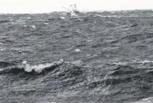  ?? ASHLEY THOMPSON • SALTWIRE NETWORK ?? A vessel bobs through Bay of Fundy waters off of the coast of Hillsburn, Annapolis County while search efforts continue for six crew members of the Chief William Saulis.