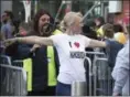  ??  ?? OWEN HUMPHREYS — PA VIA ASSOCIATED PRESS Security staff check people arriving Sunday for the One Love Manchester benefit concert for the victims of last month's Manchester Arena terror attack at the Emirates Old Trafford, Manchester, England.