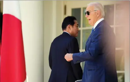  ?? ANDREW HARNIK — GETTY IMAGES ?? U.S. President Joe Biden turns to answer a reporters question following a joint press conference with Japanese Prime Minister Fumio Kishida in the Rose Garden at the White House on Wednesday in Washington, DC.