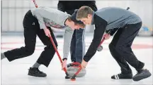  ?? CLIFFORD SKARSTEDT/EXAMINER FILE PHOTO ?? Curlers compete at the Omemee Curling Club west of Peterborou­gh. The club offers a learn to curl program.