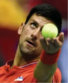  ?? ANDREJ ISAKOVIC/AFP/GETTY IMAGES ?? Novak Djokovic, who turned 30 on Monday, must regain his peak form soon in order to add to his 12 Grand Slam titles at Roland Garros.