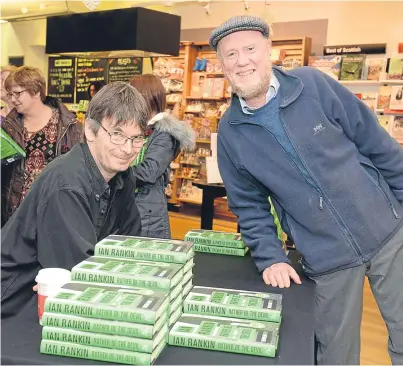  ??  ?? Author Ian Rankin with his old English teacher Ron Gillespie.: